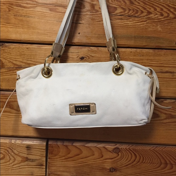 shoe polish on leather purse